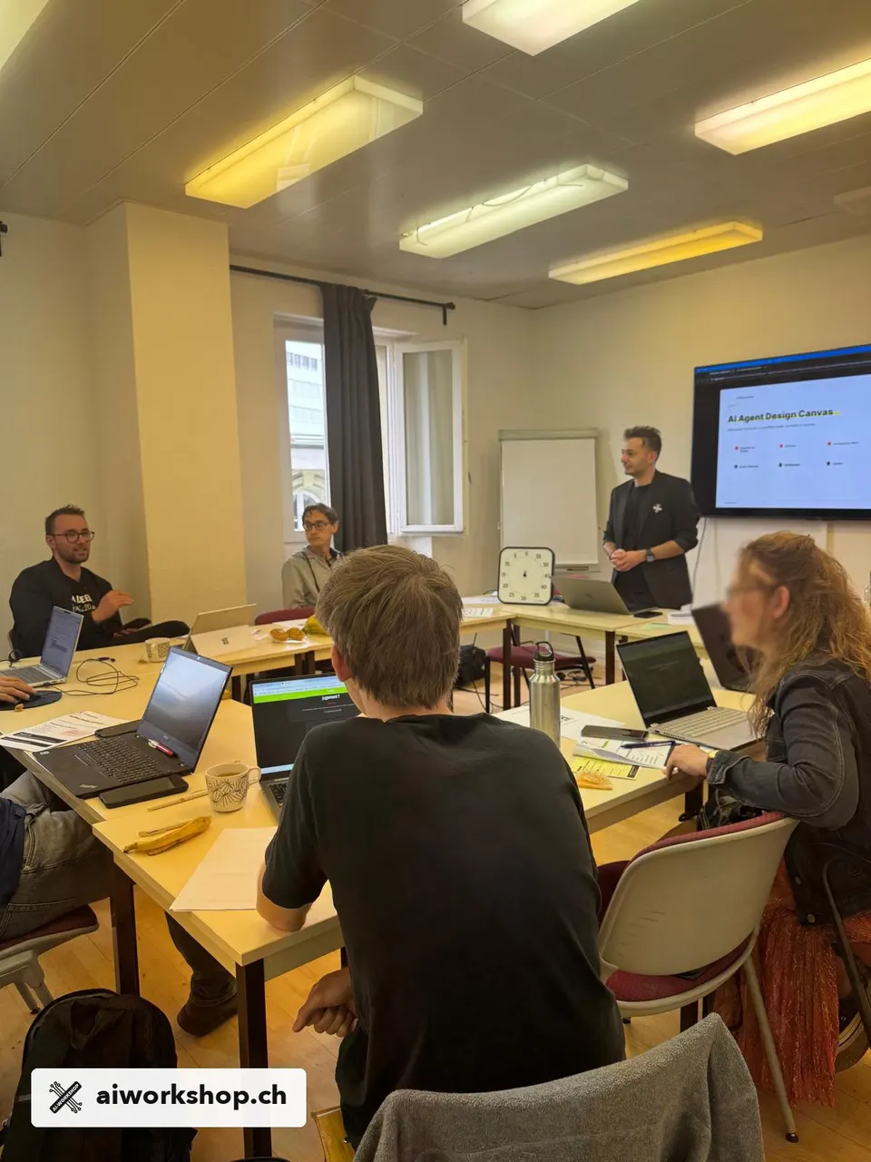Participants mapping an agent workflow with the Agent Design Canvas in Lausanne